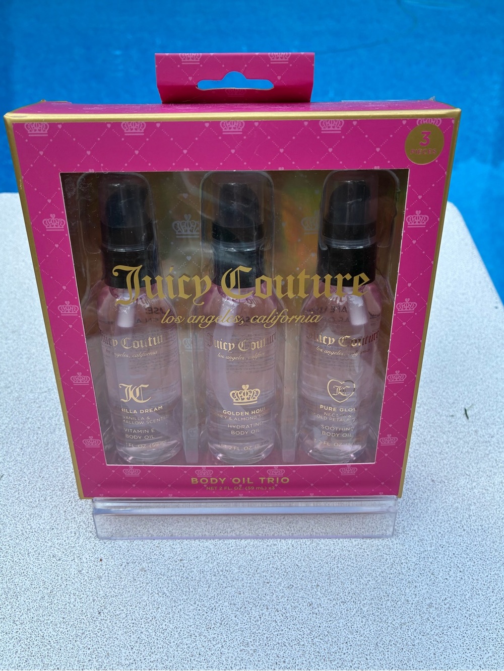 Juicy Couture Pink and Gold Body Oil Trio